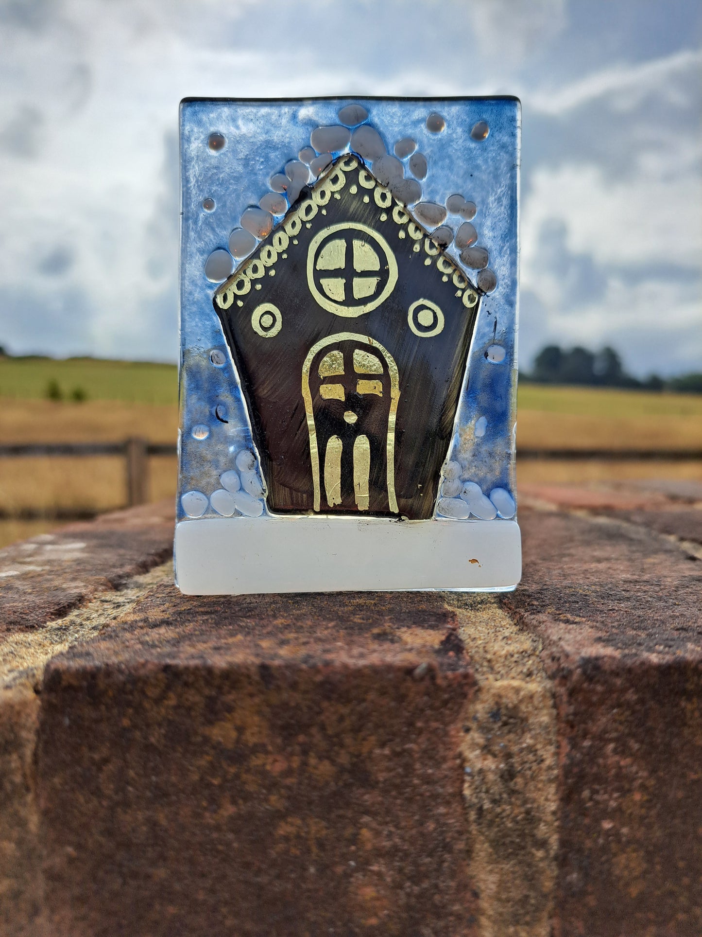 Single glowing house tealight holder