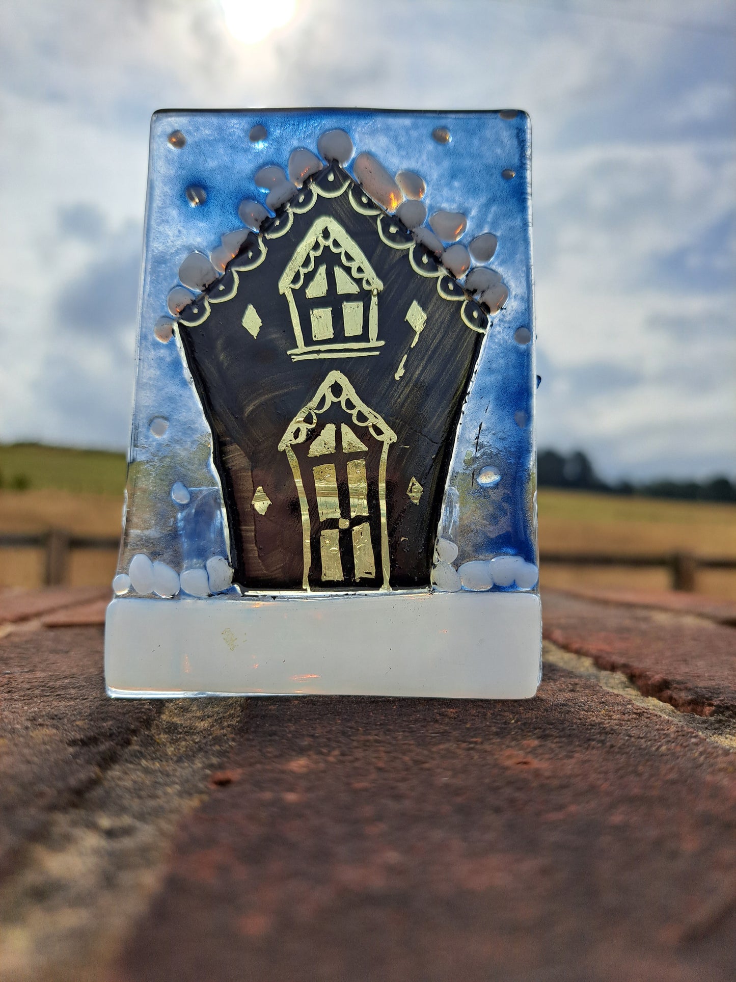 Single glowing house tealight holder