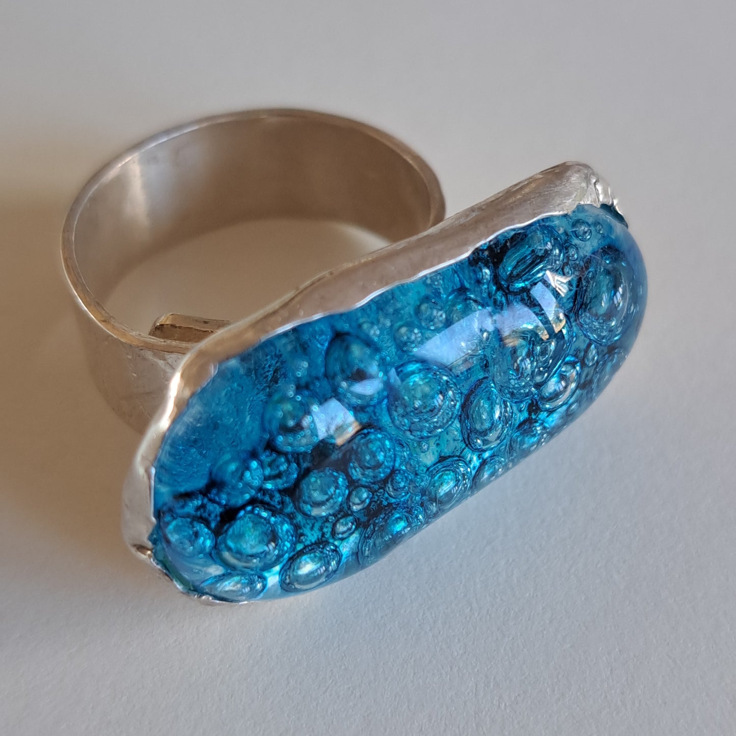 Turqoise blue bubble glass and silver ring